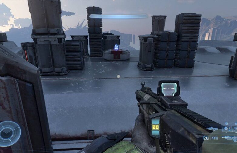 One of the Halo Infinite skulls is resting on top of a box, surrounded by various containers.