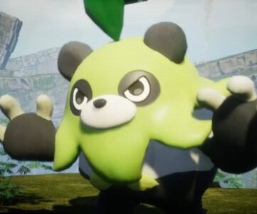 Palworld fighting: a leafy panda bear Pal getting ready to brawl beside some ancient ruins.