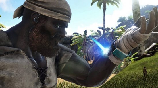 Best Ark Survival mods: Using an electronic device on the wrist with the Dino Tracker mod in Ark Survival Evolved.