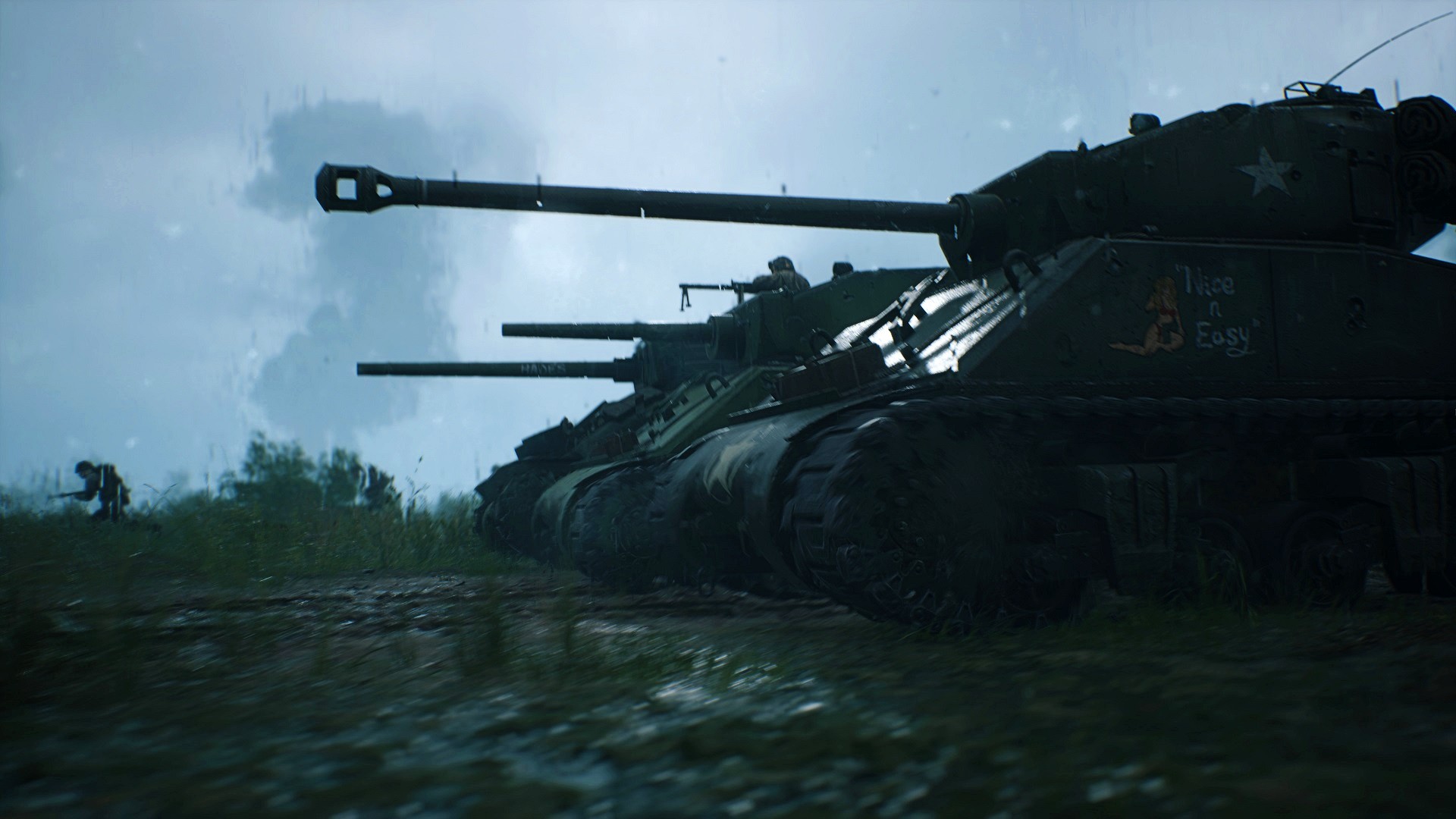 Best WW2 games: Hell Let Loose. Image shows tanks on the battlefield.